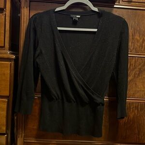 Black faux wrap sweater.